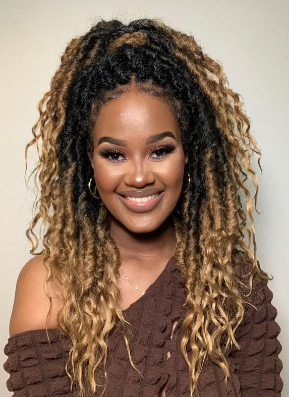 A lady with boho queen locs