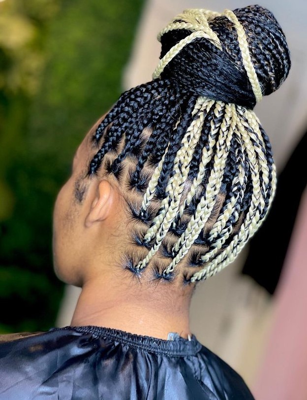 blonde peekaboo braids in a bun