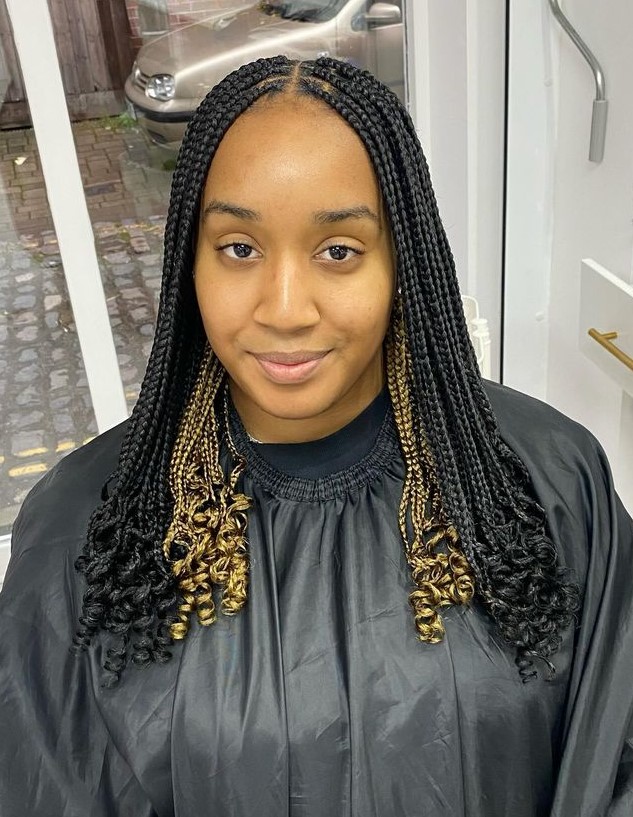 Blonde Peekaboo braids with curly ends