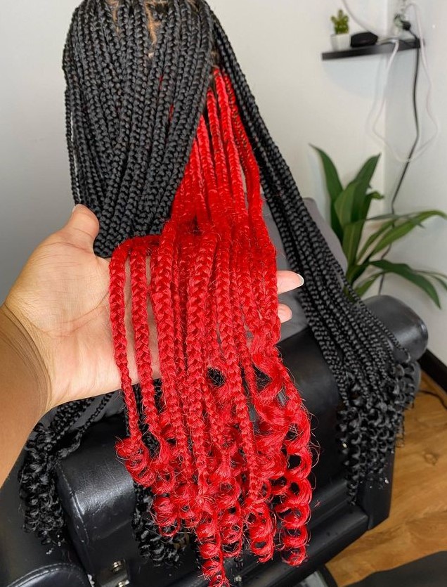 red Peekaboo braids with curly ends