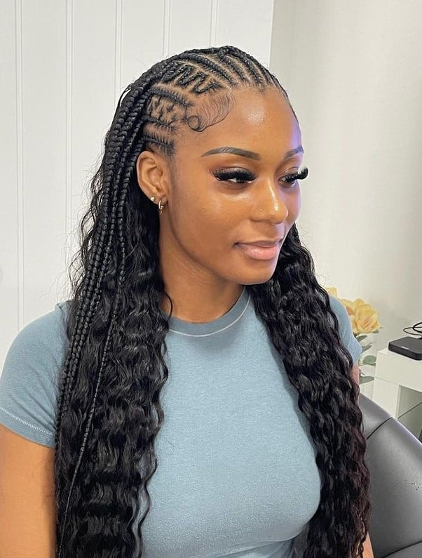 A lady with braids with weave hairstyle