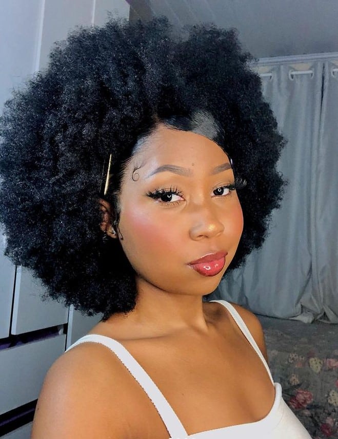 A lady with an afro hairstyle - the best natural Hairstyles 