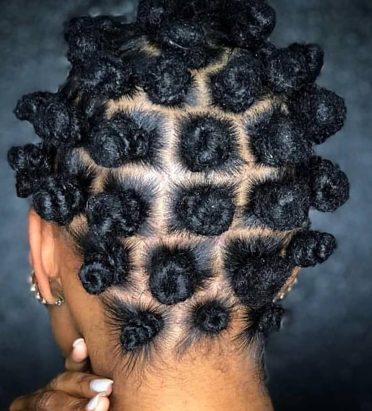 A lady with bantu knots hairstyle - the best natural Hairstyles 