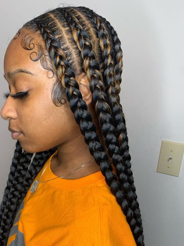 pop smoke braids on a woman